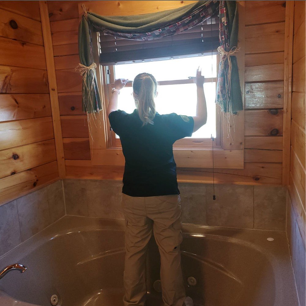 photo of inspector inspecting a bathroom | house master home inspection knoxville tn