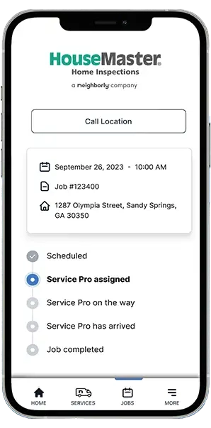 Neighborly App job progress marked 'Service Pro assigned' displayed on smartphone screen.