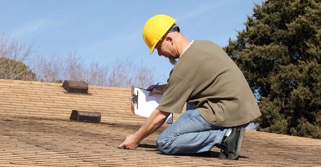 Albany Saratoga home inspector checking roof.