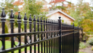 A close-up of a black fence.