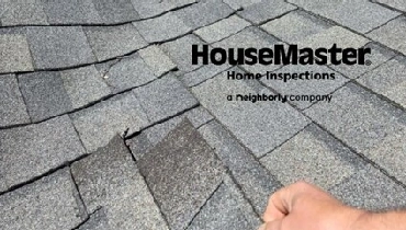 HouseMaster logo on top of visual of roof shingles.