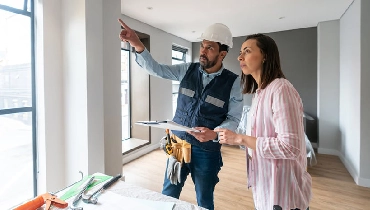HouseMaster inspector reviewing a Bronx home during a detailed property inspection