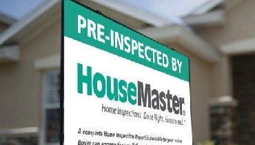 Pre-inspected by HouseMaster lawn sign.